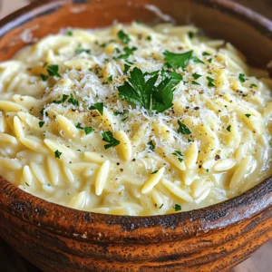 - 1 cup orzo pasta - 2 tablespoons olive oil - 3 cloves garlic, minced - 2 cups vegetable broth - 1 cup heavy cream - 1 cup freshly grated Parmesan cheese - 1 teaspoon Italian seasoning - Salt to taste - Freshly ground black pepper to taste - Fresh parsley, finely chopped (for garnish) Each ingredient plays a vital role in the flavor and texture of creamy garlic Parmesan orzo. - Orzo pasta is small and rice-shaped. It cooks quickly and absorbs flavors well. - Olive oil adds richness and helps sauté the garlic. - Garlic gives a strong, aromatic base. It transforms the dish from simple to savory. - Vegetable broth enhances the overall taste, adding depth without meat. - Heavy cream creates the creamy texture we love. It makes the dish rich and satisfying. - Parmesan cheese adds a salty, nutty flavor. Freshly grated cheese melts better and tastes great. - Italian seasoning brings a mix of herbs that complements the other flavors. - Salt and pepper enhance all the tastes. Adjust these to suit your preference. - Fresh parsley adds color and a hint of freshness as a garnish. You can swap ingredients based on what you have or your taste. - Orzo can be replaced with any small pasta like couscous or ditalini. - Olive oil can be swapped for butter for a richer flavor. - Vegetable broth can be replaced with chicken broth for more depth. - Heavy cream can be substituted with half-and-half or a plant-based cream. - Parmesan cheese can be replaced with Pecorino Romano for a sharper taste. - Italian seasoning can be made from dried basil, oregano, and thyme if you don’t have it. - Fresh parsley can be swapped for chives or basil for a different twist. These substitutions keep the dish tasty while making it easier to use what you have on hand. 1. Heat 2 tablespoons of olive oil in a large saucepan over medium heat. 2. Add 3 cloves of minced garlic. Sauté for about 1 minute until fragrant. 3. Be careful not to burn the garlic, as this can change the taste. 4. Add 1 cup of orzo pasta. Stir it in the garlic oil for 2-3 minutes. 5. Pour in 2 cups of vegetable broth and bring it to a boil. 6. Once boiling, reduce the heat to low and cover the pan. 7. Let it simmer for 10-12 minutes. Stir occasionally to prevent sticking. 8. After cooking, stir in 1 cup of heavy cream and 1 cup of grated Parmesan. 9. Add 1 teaspoon of Italian seasoning. Season with salt and pepper to taste. 10. Cook for an additional 2-3 minutes over low heat, stirring constantly. 11. Once creamy, remove from heat. Taste and adjust seasoning if needed. 12. Serve warm, garnished with chopped parsley for a fresh touch. To cook orzo perfectly, follow these tips: - Toast the Orzo: Toasting the orzo in oil enhances its nutty flavor. - Use Broth: Cooking in vegetable broth adds depth to the dish. - Stir Regularly: Stirring often helps prevent the orzo from sticking. - Monitor Cooking Time: Check the orzo to avoid overcooking. It should be al dente. Here are some common mistakes and how to avoid them: - Burning Garlic: Always sauté garlic on medium heat and watch closely. - Not Stirring: Forgetting to stir can lead to clumps and uneven cooking. - Too Much Liquid: Adding too much broth can make the dish soupy. - Skipping Seasoning: Always taste and adjust salt and pepper before serving. - Overcooking: Keep an eye on the orzo to ensure it stays tender, not mushy. To make your orzo creamy, use heavy cream. This adds richness and a smooth feel. Stir the cream in slowly and let it heat through. It should not boil. Grated Parmesan also helps with creaminess. It melts well and binds the sauce nicely. If you want a lighter dish, try half-and-half instead of cream. Just remember, you’ll lose some richness. For extra flavor, consider adding a pinch of nutmeg. This warm spice pairs well with the cream. You can also add lemon zest for brightness. Just a bit goes a long way. Fresh parsley not only adds color but also a fresh taste. You can sprinkle it on top right before serving. If you like heat, consider adding red pepper flakes. They give a nice kick. To speed up cooking, use a kettle for the broth. Boiling it first saves time. You can also prep your ingredients beforehand. Mince the garlic and chop the parsley ahead of time. This helps keep things moving in the kitchen. If you are short on time, use pre-grated Parmesan. It saves a few minutes, but fresh is always best for flavor. {{image_4}} You can boost the nutrition of creamy garlic Parmesan orzo by adding vegetables. Spinach is a great choice. It wilts down nicely and adds color. You can also use peas for a sweet pop. Broccoli florets work well too; they add a nice crunch. Just add them when the orzo cooks in the broth. This way, they will soften but still keep some texture. To make this dish heartier, consider adding protein. Grilled chicken or shrimp complements the creamy sauce. You can also use chickpeas for a plant-based option. Just stir them in when adding the cream and cheese. This makes the meal filling and satisfying. It’s perfect for a family dinner or a cozy night in. Experimenting with cheese can add new flavors to your orzo. Instead of Parmesan, try goat cheese for a tangy twist. Feta cheese also works well; it adds a salty bite. For a richer taste, use Gruyere or aged cheddar. Each cheese brings its unique flair while keeping the dish creamy. Don’t be afraid to mix and match! To keep your creamy garlic Parmesan orzo fresh, store it in an airtight container. Let it cool first, then seal it tightly. You can place it in the fridge for up to three days. Keeping it sealed helps prevent it from drying out or absorbing other smells from the fridge. Always label your container with the date to track freshness. When you are ready to enjoy leftovers, reheat the orzo gently. I recommend using a saucepan over low heat. Add a splash of vegetable broth or cream to keep it creamy. Stir it often to warm it evenly without burning. You can also microwave it. Just cover it and heat in short bursts, stirring in between. This helps maintain the dish's rich flavor. If you want to freeze the creamy garlic Parmesan orzo, use a freezer-safe container. It can last up to three months in the freezer. When freezing, leave some space at the top of the container. This allows for expansion as it freezes. To thaw, place it in the fridge overnight. Once thawed, reheat as mentioned above for the best taste. To make this dish vegan, swap the heavy cream for coconut cream or cashew cream. Use nutritional yeast instead of Parmesan cheese for a cheesy flavor. You can also add vegan butter for richness. These changes keep the creamy texture while keeping it plant-based. Yes, you can prepare Creamy Garlic Parmesan Orzo ahead of time. Cook it, let it cool, and store it in an airtight container in the fridge. It stays fresh for about three days. Reheat it gently on the stove, adding a splash of broth or water to bring back the creaminess. Creamy Garlic Parmesan Orzo pairs well with many dishes. You can serve it with grilled chicken or roasted vegetables for a complete meal. It also goes great with a fresh salad or crusty bread on the side. This adds variety and makes your meal more satisfying. This blog covered everything you need for Creamy Garlic Parmesan Orzo. We listed ingredients, shared step-by-step cooking methods, and highlighted common mistakes. You learned tips for texture, flavor, and even shortcuts. We also explored fun variations and storage ideas to keep it fresh. In summary, this dish is easy and packed with flavor. Enjoy making it your own and share it with friends!
