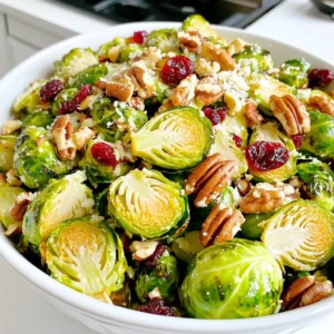 For this salad, you will need: - 1 lb Brussels sprouts, trimmed and halved - 1/2 cup pecans, roughly chopped - 1/4 cup dried cranberries These fresh ingredients form the base of the salad. The Brussels sprouts give it a nice crunch. The pecans add a nutty taste, while the cranberries bring a sweet touch. To make the dressing, gather: - 1/4 cup extra virgin olive oil - 3 tablespoons Dijon mustard - 2 tablespoons apple cider vinegar - 1 tablespoon honey - Salt and freshly cracked black pepper, to taste This dressing is simple yet flavorful. The Dijon mustard gives it a tangy kick. The honey balances that with sweetness. You can add: - 1/4 cup grated Parmesan cheese (for garnish) If you like cheese, sprinkle some Parmesan on top. It adds creaminess and extra flavor. This salad is all about mixing tastes and textures for a delightful bite. Start by washing the Brussels sprouts. Trim off the hard stem end and cut each sprout in half. This helps them cook evenly. Place the halved sprouts on a baking sheet. Preheat your oven to 400°F (200°C). Drizzle olive oil over the Brussels sprouts. Sprinkle salt and black pepper on top. Toss them well to ensure even coating. Roast for 20-25 minutes. Stir halfway through to allow even browning. They should be golden and tender when done. While the sprouts roast, prepare the dressing. In a small bowl, whisk together Dijon mustard, apple cider vinegar, and honey. Add a pinch of salt and pepper. Whisk until smooth. This dressing adds great flavor. Once the Brussels sprouts are roasted, let them cool for a few minutes. In a large bowl, combine the sprouts, chopped pecans, and dried cranberries. Drizzle the dressing over the mix and gently toss. If you like, sprinkle grated Parmesan on top for extra flavor. To roast Brussels sprouts well, start with fresh ones. Look for bright green, firm sprouts. Trim off the ends and cut them in half. This step helps them cook evenly. Preheat your oven to 400°F (200°C). This hot temperature gives them a nice crisp. Spread the halved sprouts on a baking sheet. Drizzle olive oil over them and sprinkle salt and pepper. Toss them so they are coated well. Roast for 20-25 minutes. Stir them halfway through to help them brown evenly. They are ready when they feel tender and have golden edges. A beautiful salad makes the meal feel special. Use a large wooden bowl to serve. This adds warmth and charm. Place the roasted Brussels sprouts in the bowl first. Then, add the chopped pecans and cranberries. For a nice touch, sprinkle grated Parmesan on top. This adds color and flavor. You can also add extra pecans for crunch. Arrange everything nicely so it looks inviting. This salad is a great side dish. It pairs well with roasted chicken or grilled fish. You can also enjoy it as a light meal on its own. Serve it warm or at room temperature. If you want to add protein, consider grilled chicken or chickpeas. This makes it a complete meal. Don't forget to offer extra dressing on the side for those who love a little more flavor! {{image_4}} You can make this salad a full meal by adding protein. Grilled chicken or shrimp pairs well. If you want a meat-free option, try chickpeas or lentils. They add texture and flavor. Simply toss them in with the Brussels sprouts and nuts. This makes the dish hearty and satisfying. If you want to change the flavor, try different dressings. A balsamic vinaigrette gives it a sweet and tangy taste. A creamy ranch dressing adds a rich touch. You can even use a citrus dressing for a fresh twist. Mix and match until you find your favorite. Feel free to swap ingredients based on the season. In fall, add roasted squash for sweetness. In winter, toss in pomegranate seeds for a pop of color. In spring, try fresh herbs like mint or basil. These changes keep the salad exciting and fresh. To store leftover salad, place it in an airtight container. Make sure to cover it well. Put the container in the fridge. This keeps it fresh for up to three days. However, the Brussels sprouts may lose some crunch. If you like them crispy, eat the salad soon after making it. I do not recommend freezing this salad. Freezing changes the texture of Brussels sprouts. They can become mushy when thawed. The pecans and cranberries also lose their good crunch. It’s best to enjoy this salad fresh. If you want to reheat the salad, do so gently. You can warm it in a pan over low heat. Add a splash of olive oil to help it warm evenly. Stir gently to avoid overcooking. Serve it warm with a sprinkle of fresh cheese on top for added flavor. Yes, you can use frozen Brussels sprouts if fresh ones are not available. However, they may not have the same texture. Frozen sprouts can become mushy when cooked. For best results, thaw them first and pat them dry before roasting. This helps them crisp up nicely. If you don’t have Dijon mustard, you can use yellow mustard. It has a milder taste, so add a little extra for flavor. Another option is to mix equal parts of mustard powder and vinegar. This gives a similar taste with a bit of a kick. The salad stays fresh for about three days in the fridge. Store it in an airtight container. However, the texture may change as the dressing soaks in. For the best taste, enjoy it within the first two days. Yes, this salad is gluten-free. All the ingredients are safe for a gluten-free diet. Just make sure to check your Dijon mustard for any hidden gluten. Most brands are fine, but it’s always best to look at the label. In this blog post, we explored fresh ingredients for a tasty salad. I shared steps for prepping Brussels sprouts, roasting them perfectly, and making a delightful dressing. You learned how to present and serve the salad beautifully. We also discussed variations to suit your taste and how to store any leftovers. Enjoy making this salad your own. Experiment with flavors and ingredients. You’ll create a dish that everyone loves!