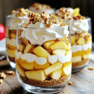 - 2 cups apple pie filling (store-bought or homemade) - 1 cup heavy cream - 1/4 cup powdered sugar - 1 teaspoon vanilla extract - 1 teaspoon ground cinnamon - 1 cup crushed graham crackers - 1/2 cup chopped walnuts (optional) - Fresh apple slices for garnish - Additional whipped cream (store-bought or homemade) for layering For the whipped cream, you need heavy cream. If you want a lighter option, use half-and-half. The powdered sugar adds sweetness. You can swap it with regular sugar if you prefer. For the apple pie filling, use homemade or a good store brand. They both work well. The cinnamon enhances flavor. You can try nutmeg for a twist. You can add chopped walnuts for crunch. If you want to skip nuts, use toasted coconut instead. For extra flavor, try adding a splash of caramel sauce between layers. If you love a fruity twist, include fresh berries with the apple slices. This makes your parfait unique and fun! To whip the cream, start with a clean mixing bowl. Add the heavy cream, powdered sugar, and vanilla extract. Using a hand mixer, whip the mixture on medium speed. Watch closely as soft peaks form. You want it light and fluffy, so avoid overwhipping. It should hold its shape but not be too stiff. In a small bowl, combine the crushed graham crackers with ground cinnamon. Mix well to spread the cinnamon evenly. This adds a warm flavor that pairs perfectly with the apple pie filling. Set this mixture aside for later use. It will create a nice base in the parfaits. Choose clear serving glasses or bowls. These will show off your layers. Start with a layer of the cinnamon graham cracker mixture at the bottom. Next, add a generous spoonful of apple pie filling, spreading it evenly. Then, dollop a layer of whipped cream on top. Repeat this process until you fill the glass. Finish with a lovely dollop of whipped cream at the top. For garnish, you can sprinkle chopped walnuts on top if you like. Fresh apple slices make a beautiful finishing touch. They add color and freshness. Once garnished, place the parfaits in the refrigerator for at least 30 minutes. This chilling time helps the flavors blend. Enjoy your delicious creation! To make fluffy whipped cream, start with cold heavy cream. Cold cream whips better, giving you a light texture. Add powdered sugar and vanilla to sweeten the cream. Mix on medium speed until soft peaks form. Be careful! Overwhipping makes the cream grainy. Stop mixing right when you see fluffy peaks. One common mistake is using warm cream. Warm cream won't whip well. Another mistake is overwhipping. This can lead to butter instead of cream. Avoid skipping the chilling step. Chilling the parfaits helps flavors blend. Finally, be sure to layer evenly. Uneven layers can make the parfaits hard to enjoy. Use clear glasses for serving. This shows off the beautiful layers. Top each parfait with a generous dollop of whipped cream. A sprinkle of cinnamon adds a lovely touch. For a fun twist, add chopped walnuts on top. Fresh apple slices also make a great garnish. Serve with a cute spoon for a special touch. {{image_4}} You can switch up the filling to create new tastes. Try using cherry pie filling for a tart twist. Peach pie filling brings a sweet and juicy flavor. For a fun seasonal option, use pumpkin pie filling in fall. Each fruit offers a unique flavor that pairs well with whipped cream. Instead of crushed graham crackers, mix it up with crushed cookies. Oreo cookies add a rich chocolate flavor. Shortbread cookies provide a buttery base. You can even use nuts for a crunchier texture. Each crust type will change the overall taste and texture of the parfaits. Making a vegan version of these parfaits is simple. Use coconut cream instead of heavy cream. It whips up well and tastes great. Opt for maple syrup or agave instead of powdered sugar for sweetness. Use dairy-free pie filling or make your own with fresh fruit. This way, everyone can enjoy a delicious treat! To store your parfaits, keep them in the fridge. Use airtight containers or cover them with plastic wrap. This keeps the parfaits fresh and tasty. Avoid stacking them to prevent spills. Always store the parfaits in the original serving glasses if you can, as it helps maintain their lovely look. These parfaits last about 2 to 3 days in the refrigerator. After this time, the flavors may start to fade. If you notice any changes in smell or texture, it&rsquo;s best to discard them. Remember, the fresher, the better! You do not need to reheat these parfaits. They are best served cold. If they seem a bit flat, you can whip some extra cream to refresh the layers. Just add the new whipped cream on top for a light and airy touch. Enjoy your delicious dessert! Yes, you can make these parfaits ahead of time. Prepare them up to a day before serving. Just layer the ingredients in your glasses and store them in the fridge. This helps the flavors blend well. Just add your garnishes right before serving for the best look. If you want to avoid heavy cream, you have options. You can use coconut cream for a dairy-free version. Another choice is to use whipped topping. Both will give you a nice, fluffy texture. Your parfaits will still taste great with these substitutes. To make gluten-free parfaits, use gluten-free graham crackers. Many brands offer gluten-free options that work well. Just check the label to ensure they fit your needs. This way, everyone can enjoy your delicious dessert. Freezing these parfaits is not the best idea. The whipped cream and apple filling may not freeze well. They can lose their texture and flavor. Instead, enjoy them fresh or chilled for the best taste and experience. In this blog post, we explored making Apple Pie Whipped Cream Parfaits. You learned about key ingredients, measurements, and how to customize your recipe. I shared step-by-step instructions for whipping cream, layering, and serving. We covered tips for perfecting your parfaits and variations for different tastes. These treats are fun to make and easy to store. Try them today!