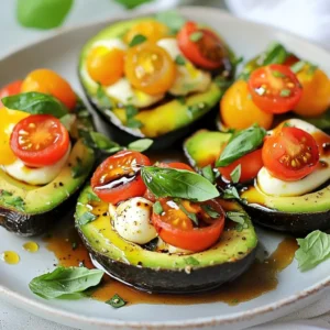 - 2 ripe avocados - 1 cup cherry tomatoes, halved - 1 cup fresh mozzarella balls, halved - 1/4 cup fresh basil leaves, finely chopped - 2 tablespoons balsamic glaze - 1 tablespoon extra virgin olive oil - Salt and freshly ground black pepper, to taste To make Caprese stuffed avocados, you need simple, fresh ingredients. Start with ripe avocados. They should feel soft but not mushy. Next, gather juicy cherry tomatoes. Halve them for easy mixing. Fresh mozzarella balls add creaminess. You can find these in the cheese section. Fresh basil leaves bring a bright flavor. Chop them finely for best results. Balsamic glaze adds a sweet touch. You can make your own or buy it at the store. Extra virgin olive oil enhances the flavor. Finally, don&rsquo;t forget salt and pepper to taste. These ingredients combine for a fresh and tasty treat. Each bite offers a mix of flavors and textures. You will enjoy this light dish, whether for lunch or a snack. {{ingredient_image_2}} - Halving and Pitting Start by taking your ripe avocados. Carefully slice them in half lengthwise. Gently twist the halves apart. Use a spoon to remove the pit. Be cautious not to damage the flesh. - Scooping Out Avocado Flesh With a spoon, scoop out a small amount of avocado flesh from each half. This creates space for your filling. Place the scooped flesh into a separate bowl. This flesh adds creaminess to your dish. - Mixing Cherry Tomatoes, Mozzarella, and Basil In a medium bowl, combine your halved cherry tomatoes, halved mozzarella balls, and finely chopped basil leaves. This mix gives a fresh taste. - Seasoning with Olive Oil and Balsamic Glaze Drizzle two tablespoons of balsamic glaze into the bowl. Add one tablespoon of extra virgin olive oil as well. Season with salt and freshly ground black pepper. Stir gently to coat all the ingredients. - Incorporating Reserved Avocado Flesh Gently fold the reserved avocado flesh into the Caprese mixture. Be careful not to mash the ingredients. You want a nice mix of flavors and textures. - Filling Each Avocado Half Use a spoon to fill each avocado half with the Caprese mixture. Press down slightly to pack it well. This ensures each bite is full of flavor. - Ripe vs. Overripe Choose avocados that feel slightly soft but not mushy. Press gently on the skin. If it gives a little, it&rsquo;s ripe. If it feels too soft, it&rsquo;s overripe. Overripe avocados can taste bitter and will not hold their shape when sliced. - Storing Avocados for Optimal Freshness Keep unripe avocados at room temperature until they ripen. Once ripe, store them in the fridge to slow down further ripening. This helps them stay fresh longer, usually up to a week. If you cut an avocado, sprinkle lemon juice on it to prevent browning. - Adjusting Seasoning to Taste Always start with a pinch of salt and pepper. Taste the filling before stuffing the avocados. You can add more salt, pepper, or even herbs like oregano or thyme to enhance the flavor. - Additional Ingredients to Consider Want to mix it up? You can add diced red onion for crunch or sliced olives for a briny kick. For a spicy twist, try adding crushed red pepper flakes. This will give your Caprese stuffed avocados a fresh and unique spin! Pro Tips Choose Ripe Avocados: Ensure your avocados are perfectly ripe for the best flavor and texture. They should yield slightly to gentle pressure when squeezed. Fresh Ingredients Matter: Use the freshest mozzarella and basil possible to enhance the overall taste of the dish. Customize the Filling: Feel free to add other ingredients like diced cucumbers or olives for extra flavor and texture variation. Presentation is Key: For an elegant touch, serve the stuffed avocados on a bed of mixed greens or with a side of crusty bread. {{image_4}} You can switch the cheese in this recipe. Instead of fresh mozzarella, try feta or goat cheese. These cheeses add a sharp, tangy taste. This change can brighten up the dish. You will enjoy the creaminess of the avocado with these flavors. You can also add protein to your stuffed avocados. Grilled chicken or shrimp works great. This adds a nice texture and makes the dish more filling. You can mix the cooked protein into the Caprese filling. It&rsquo;s a simple way to turn this appetizer into a meal. Try using different herbs to change the flavor. Instead of basil, use parsley or cilantro. Each herb brings a unique taste to the dish. You can even mix herbs for a more complex flavor. Using flavored balsamic glaze is another fun idea. You can find balsamic glazes infused with flavors like garlic or chili. This will add depth to your dish. Don't be afraid to experiment! Each tweak can make your Caprese stuffed avocados even more exciting. - Refrigeration Tips: Store leftover Caprese stuffed avocados in the fridge. This keeps them fresh. Place them in a cool spot, and consume them within two days. The flavors stay bright if stored well. - Container Recommendations: Use an airtight container to avoid browning. Wrap each avocado half in plastic wrap for extra protection. This method helps maintain the taste and texture. - Maintaining Texture and Flavor: Reheat gently if needed. Use a low heat setting in the microwave for a few seconds. This helps keep the avocados creamy and the filling fresh. Avoid overheating, as this can make the dish mushy. Enjoy your Caprese stuffed avocados at room temperature, as they taste best fresh! To make Caprese stuffed avocados vegan, I swap out fresh mozzarella for a plant-based cheese. You can use vegan mozzarella or even cashew cheese. This keeps the creamy texture while making it dairy-free. Add a bit of nutritional yeast for a cheesy flavor boost. Yes, you can prepare the filling in advance. Mix the cherry tomatoes, plant-based cheese, and basil, then store it in the fridge. I recommend stuffing the avocados right before serving. This keeps them fresh and prevents browning. Caprese stuffed avocados pair well with many sides. Here are some ideas: - Recipe for Pairing Suggestions - Grilled chicken or shrimp adds protein. - A fresh green salad with lemon dressing is light and bright. - Serve with crusty bread to soak up the extra balsamic glaze. - Side Dish Ideas - Roasted vegetables bring out rich flavors. - Quinoa salad adds a nutty texture. - Pasta with a light olive oil sauce complements the dish well. This blog post covered a delicious recipe for Caprese Stuffed Avocados. We detailed every ingredient needed, like ripe avocados, cherry tomatoes, and fresh mozzarella. You learned how to prepare the avocados and create a tasty filling. We also shared tips on selecting the best avocados and suggested fun variations. Remember to store leftovers properly for the best taste. Enjoy experimenting with flavors and serving your stuffed avocados. This dish is not just healthy&mdash;it's a great way to impress your friends and family!
