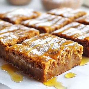 - 2 &frac12; cups all-purpose flour - 1 teaspoon baking powder - 1 teaspoon baking soda - 2 teaspoons ground ginger - 2 teaspoons ground cinnamon - &frac12; teaspoon ground nutmeg - &frac12; teaspoon ground cloves - &frac12; teaspoon salt I love starting with dry ingredients. They form the base of our gingerbread cookie bars. All-purpose flour gives the bars structure. Baking powder and baking soda help them rise and stay fluffy. The spices, like ginger and cinnamon, add that warm holiday taste. Nutmeg and cloves give it a cozy feel. Salt balances the sweetness and brings out the flavors. - &frac34; cup unsalted butter, softened - 1 cup brown sugar, firmly packed - 1 large egg - &frac12; cup molasses - 1 teaspoon pure vanilla extract - &frac12; cup maple syrup (for drizzling) Now, let's mix in the wet ingredients. Softened butter makes the bars rich and creamy. Brown sugar adds a deep, sweet flavor. The egg binds everything together, while molasses gives a warm, dark sweetness. Pure vanilla extract enhances the taste. Finally, maple syrup drizzled on top is the cherry on the cake. - Powdered sugar for dusting I often love to dust my bars with powdered sugar. It looks pretty and adds a light sweetness. You can skip this step, but it makes the bars feel more festive. {{ingredient_image_2}} First, preheat your oven to 350&deg;F (175&deg;C). This step warms the oven for even baking. Next, prepare a 9x13 inch baking dish. You can grease it lightly or line it with parchment paper. Lining helps when taking out the bars later. Start by mixing your dry ingredients. In a medium bowl, whisk together: - 2 &frac12; cups all-purpose flour - 1 teaspoon baking powder - 1 teaspoon baking soda - 2 teaspoons ground ginger - 2 teaspoons ground cinnamon - &frac12; teaspoon ground nutmeg - &frac12; teaspoon ground cloves - &frac12; teaspoon salt Make sure everything is mixed well for a good flavor. Now, let&rsquo;s cream butter and sugar. In a large bowl, use an electric mixer to beat: - &frac34; cup unsalted butter, softened - 1 cup brown sugar, firmly packed Mix until it becomes light and fluffy, about 3 to 4 minutes. This step is key. It helps make the bars soft. Once the butter and sugar are ready, add the wet ingredients: - 1 large egg - &frac12; cup molasses - 1 teaspoon pure vanilla extract Mix these until well blended. Now, combine the dry and wet mixtures. Gradually add the dry mix to the wet mix. Use low speed to mix until just combined. Don&rsquo;t over-mix; it can make the bars dense. Pour the batter into your prepared dish. Use a spatula to spread it evenly. This helps it bake uniformly. Place your baking dish in the oven. Bake for 20 to 25 minutes. To check if they are done, insert a toothpick in the center. It should come out clean or with a few moist crumbs. Once baked, take the dish out of the oven. Let it cool in the pan for about 10 minutes. Then, transfer the bars to a wire rack. This cooling step is important. It allows them to firm up before cutting. To ensure even baking, spread the batter well in your pan. Use a spatula to smooth it out. This helps the bars bake uniformly. You can also rotate the pan halfway through baking to promote even heat distribution. To test for doneness, insert a toothpick into the center. If it comes out clean or with a few moist crumbs, your bars are done. This simple test prevents over-baking and keeps them soft. Drizzling maple syrup adds sweetness and a nice shine. Use a spoon to create a lovely drizzle across the top. For a festive touch, lightly dust the bars with powdered sugar. This gives them a snowy look that&rsquo;s perfect for the holidays. You can also add toppings for extra flair. Consider crushed nuts, chocolate chips, or even dried fruits. These toppings add texture and flavor, making your bars even more special. One common mistake is over-mixing the batter. Mix just until combined to keep your bars soft and chewy. Over-mixing can lead to dense cookies that are less enjoyable. Another issue is incorrect oven temperature settings. Always preheat your oven properly. An oven that is too hot can burn the edges while leaving the center raw. Use an oven thermometer to check accuracy if you&rsquo;re unsure. Pro Tips Use Fresh Spices: For the best flavor, ensure your ground spices are fresh. Old spices can lose their potency and affect the overall taste of your cookie bars. Room Temperature Ingredients: Make sure your butter and egg are at room temperature before you start. This helps create a smoother batter and better texture in your final bars. Don&rsquo;t Overmix: When combining the wet and dry ingredients, mix just until combined. Overmixing can lead to tough bars, so be gentle! Variations: Feel free to add mix-ins like chocolate chips or nuts for added texture and flavor. Just be sure to adjust your baking time if needed. {{image_4}} If you want gluten-free gingerbread bars, use almond flour or gluten-free flour blend. These options keep the flavor but change the texture a bit. For vegan substitutions, swap the egg with a flax egg. Mix one tablespoon of ground flaxseed with three tablespoons of water and let it sit until it thickens. Use coconut oil instead of butter. This makes the bars plant-based and still tasty. You can add nuts like walnuts or pecans for a nice crunch. Chocolate chips also work well for a sweet twist. Consider using dark chocolate for a richer taste. You can also play with spices. Add some allspice or cardamom for a unique flavor. A pinch of cayenne pepper can bring a fun heat to your bars. These bars are great on their own, but toppings can enhance them. Serve with a scoop of vanilla ice cream or whipped cream. You can drizzle them with extra maple syrup for a sweet finish. For drinks, pair them with hot cocoa, spiced cider, or a warm cup of tea. These combinations add a festive touch to any gathering. To keep your gingerbread cookie bars fresh, store them in an airtight container. This helps lock in moisture and prevents them from drying out. Place a piece of parchment paper between layers if stacking them. Keep the container at room temperature for a soft texture. If you want them to last longer, consider refrigeration. However, this may change the texture slightly. You can freeze gingerbread cookie bars for later enjoyment. First, let the bars cool completely. Next, cut them into squares or rectangles. Wrap each piece tightly in plastic wrap. Then place the wrapped bars in a freezer-safe bag or container. When you're ready to enjoy them, remove the bars from the freezer and let them thaw in the fridge overnight. For a quick fix, you can microwave them for a few seconds. When stored properly, gingerbread cookie bars stay fresh for about one week at room temperature. If kept in the fridge, they can last up to two weeks. For frozen bars, aim to consume them within three months for the best flavor. After this time, they may still be safe to eat but might lose some taste and texture. To cut gingerbread cookie bars evenly, wait until they cool completely. Use a sharp knife for clean cuts. Start by scoring the top in lines, then cut through. This method gives you uniform pieces. For extra neatness, wipe the knife with a damp cloth between cuts. You can also use a ruler to measure for perfect squares. Yes, you can make these bars ahead of time. They store well for several days. Bake and cool the bars completely, then wrap them tightly in plastic wrap. This keeps them fresh. You can also freeze them for up to three months. Thaw in the fridge overnight before serving. This way, you can enjoy them anytime! To boost flavor, try adding more spices. Additional ground ginger or allspice can deepen the taste. You can also mix in some orange zest for a fresh twist. Another great option is to fold in chocolate chips or nuts. These add texture and richness. Experiment with flavors to find your favorite blend! In this post, we explored how to make delicious gingerbread cookie bars. We discussed the key dry and wet ingredients, plus optional ones for added sweetness. You learned step-by-step instructions for mixing, baking, and cooling. I shared tips for perfect results and ways to customize flavors. Lastly, we covered storage tips and answered common questions. Enjoy baking these bars; they are perfect for any occasion!