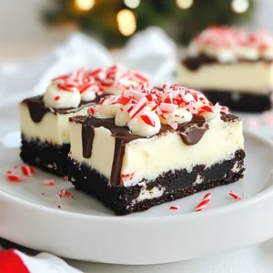 - 24 Oreo cookies, finely crushed - 1/2 cup unsalted butter, melted - 1 cup cream cheese, softened - 1 cup powdered sugar - 1 teaspoon peppermint extract - 1 cup whipped topping (like Cool Whip) - 1/2 cup chocolate chips (for topping) - 1/2 teaspoon vegetable oil - Crushed peppermint candies or candy canes (for garnish) To make these no-bake peppermint Oreo bars, you need simple ingredients. Start with 24 Oreo cookies. You will crush them into fine crumbs. The crumbs create a tasty crust that holds everything together. Next, you will need unsalted butter. The melted butter binds the cookie crumbs. This helps form a solid base for the bars. For the creamy filling, grab cream cheese. Make sure it&rsquo;s soft, so it mixes well. You also need powdered sugar. It sweetens the cream cheese and gives it a nice texture. Add one teaspoon of peppermint extract. This gives the filling its minty flavor. You can&rsquo;t have peppermint bars without this key ingredient! You will also use whipped topping like Cool Whip. This makes the filling light and fluffy. For the topping, gather half a cup of chocolate chips. You will melt these for a rich finish. Add half a teaspoon of vegetable oil to help the chocolate melt smoothly. Finally, you can use crushed peppermint candies or candy canes to garnish. They add a festive touch and extra crunch. With these ingredients, you&rsquo;ll create a delicious holiday treat that is sure to impress! {{ingredient_image_2}} - First, take 24 finely crushed Oreo cookies and place them in a bowl. - Melt 1/2 cup of unsalted butter in the microwave or on the stove. - Pour the melted butter over the crushed Oreo cookies. - Mix these together until the crumbs are fully coated with butter. - Grab an 8-inch square pan and transfer the Oreo mixture. - Press the mixture down firmly using your hands or a measuring cup. - In a mixing bowl, beat 1 cup of softened cream cheese. - Keep mixing until it is smooth and creamy. - Gradually add in 1 cup of powdered sugar and 1 teaspoon of peppermint extract. - Continue mixing until it is well combined and fluffy. - Gently fold in 1 cup of whipped topping using a spatula. - Make sure it mixes well, creating a light and airy filling. - Carefully spread the cream cheese mixture over the Oreo crust. - Use a spatula to smooth it out evenly. - In a microwave-safe bowl, combine 1/2 cup of chocolate chips with 1/2 teaspoon of vegetable oil. - Heat in the microwave for 30 seconds, stirring until melted and glossy. - Drizzle the melted chocolate generously over the cream cheese layer. - For a festive touch, sprinkle crushed peppermint candies on top. - Cover the pan with plastic wrap and refrigerate for at least 4 hours. - Once set, cut into 16 bars and serve chilled for the best flavor. - Serve the bars chilled for the best taste. - Cut into 16 bars for easy sharing. - For a festive look, arrange them on a colorful platter. - Garnish with extra crushed peppermint candies for added flair. - For gluten-free options, use gluten-free Oreo cookies. - Substitute the cream cheese with a vegan cream cheese for a vegan option. - Use a plant-based whipped topping to keep it dairy-free. - Do not overmix the cream cheese mixture; it can become too soft. - Make sure to let the bars set in the fridge for at least 4 hours. - If they are too soft, they may fall apart when you cut them. - Always check that the chocolate is fully melted before drizzling. Pro Tips Use Room Temperature Ingredients: Make sure your cream cheese is softened to room temperature before mixing. This helps create a smoother and creamier filling without lumps. Chill for Best Results: For the best flavor and texture, allow the bars to chill for a full 6 hours if possible. This helps the layers set perfectly and enhances the taste. Customize Your Toppings: Feel free to get creative with toppings! Try adding different crushed candies or even drizzling white chocolate for a festive touch. Perfect Cutting Technique: To achieve clean cuts when slicing the bars, run a sharp knife under hot water, then dry it before cutting. This will help prevent sticking. {{image_4}} You can mix things up with different extracts. Try using vanilla or almond extract instead of peppermint. This change can give your bars a new twist. You can also switch the cookie base. Using Gingerbread Oreos instead of regular ones adds a warm, spicy flavor. This is great for holiday gatherings. For toppings, feel free to get creative. Instead of chocolate, you can use white chocolate or dark chocolate. Melt it just like you do with the regular chocolate. You can also add sprinkles or colorful candies on top. This makes your bars look festive and fun. Need a smaller or larger batch? It&rsquo;s easy! To make smaller bars, cut the recipe in half. This works well for a quick treat. For a larger batch, simply double the ingredients. Just be sure to use a bigger pan. Adjust your chilling time if needed. To keep your No-Bake Peppermint Oreo Bars fresh, store them in the fridge. Place the bars in an airtight container. If you don&rsquo;t have one, wrap the pan tightly with plastic wrap. This helps prevent odors from other foods. The bars will stay fresh for about 5 to 7 days in the fridge. Want to enjoy these treats later? You can freeze them! Cut the bars into pieces and place them in a single layer on a baking sheet. Freeze until solid, then transfer them to a freezer-safe container. They can last for up to 3 months in the freezer. To thaw, take them out and place them in the fridge for a few hours. This helps keep the texture nice and smooth. Check your bars before eating them. If they smell off or have a strange texture, they may be spoiled. Look for any mold or discoloration. If you see any of these signs, it&rsquo;s best to toss them. Always trust your nose and eyes! Yes, you can use low-fat cream cheese. However, it will change the texture. Low-fat cream cheese can be thinner and less rich. Your bars may not be as creamy. If you prefer a lighter option, this is a good choice. Just know that the flavor may not be as full. You can keep these bars in the fridge for up to a week. Store them in an airtight container. They stay fresh and tasty for several days. If you want to keep them longer, they can last in the freezer for about three months. Just make sure to wrap them tightly. Yes, you can make these bars ahead of time. They are great for meal prep or parties. I suggest making them at least one day before you plan to serve them. This allows the flavors to blend well. Just remember to let them chill in the fridge for at least four hours before serving. This recipe guide covered all you need to create delicious peppermint Oreo bars. You learned about the needed ingredients, easy steps, and helpful tips. Remember to adjust for dietary needs and avoid common mistakes to ensure success. These bars are perfect for any celebration. Whether you freeze leftovers or make variations, you'll enjoy every bite. Keep them chilled, and watch for signs of spoilage. These treats are sure to impress friends and family, making your gatherings sweeter. Enjoy making these tasty bars!
